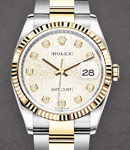 Datejust 36mm in Steel with Yellow Gold Fluted Bezel on Oyster Bracelet with Silver Jubilee Diamond Dial