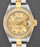 Datejust 26mm in Steel with Yellow Gold Fluted Bezel on Oyster Bracelet with Champagne Roman Dial