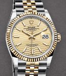 Datejust 36mm in Steel with Yellow Gold Fluted Bezel on Jubilee Bracelet with Champagne Fluted Motif Dial