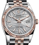 Datejust  36mm Steel with Rose Gold Fluted Bezel on Jubilee Bracelet with Silver Palm Motif Dial