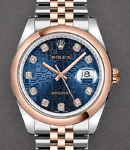 Datejust 36mm in Steel with Rose Gold Smooth Bezel on Jubilee Bracelet with Blue Jubilee Diamond Dial