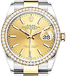 Datejust 36mm in Steel with Yellow Gold Diamond Bezel on Oyster Bracelet with Champagne Stick Dial