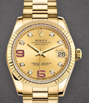 Midsize President 31mm in Yellow Gold with Fluted Bezel on President Bracelet with Champagne Diamond Dial - Ruby on 6 and 9