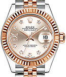 Lady's Datejust 26mm in Steel with Rose Gold Fluted Bezel on Jubilee Bracelet with Sundust Star Diamond Dial