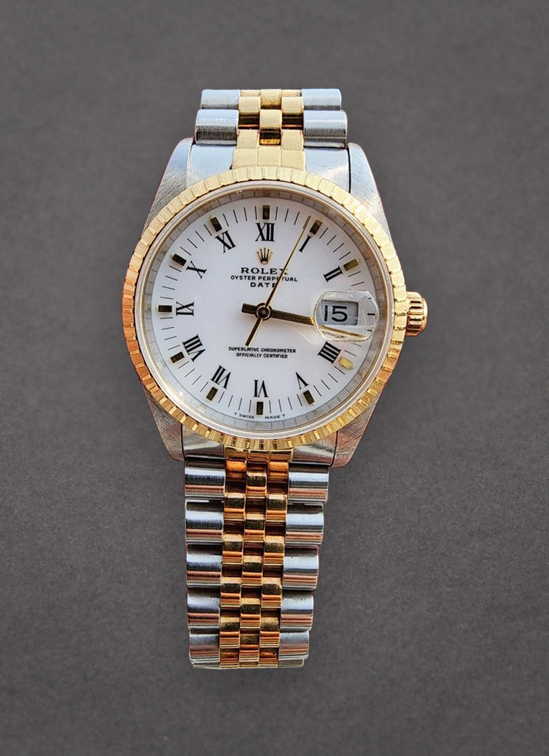 Pre-Owned Rolex Date 34mm in Steel with Yellow Gold Fluted Bezel