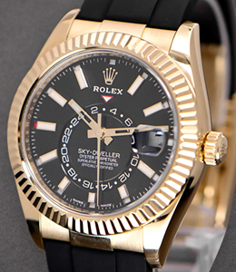 Sky Dweller in Yellow Gold with Fluted Bezel on Rubber Strap with Black Stick Dial