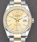 Datejust 36mm in Steel with Yellow Gold Diamond Bezel on Oyster Bracelet with Champagne Palm Motif Dial