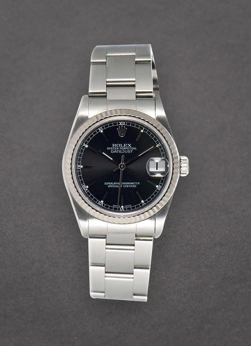 Pre-Owned Rolex Lady's 26mm Datejust in Steel with White Gold Fluted Bezel