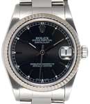Lady's 26mm Datejust in Steel with White Gold Fluted Bezel on Oyster Bracelet with Black Stick Dial