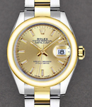 Datejust 26mm in Steel with Yellow Gold Domed Bezel on Oyster Bracelet with Champagne Stick Dial