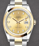 Datejust 36mm in Steel with Yellow Gold Smooth Bezel on Oyster Bracelet with Champagne Diamond Dial