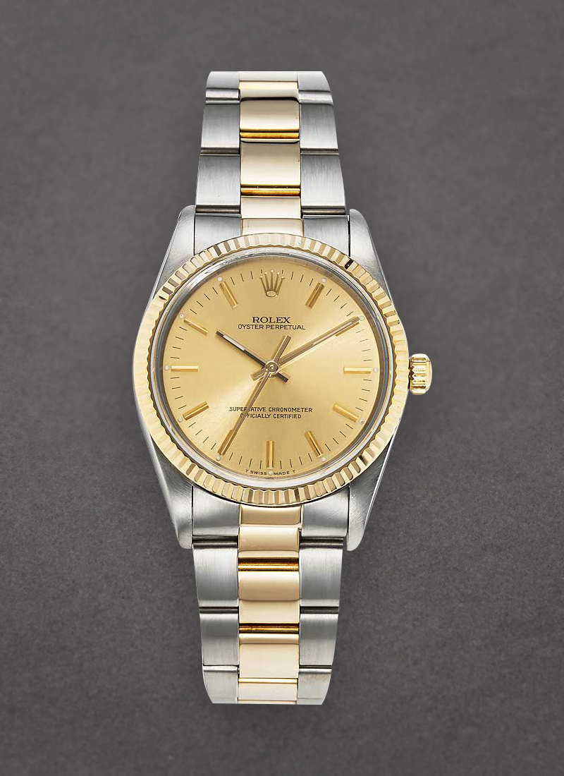 Pre-Owned Rolex Oyster Perpetual No Date 34mm in Steel with Yellow Gold Fluted Bezel