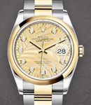 Datejust 36mm in Steel with Yellow Gold Smooth Bezel on Oyster Bracelet with Champagne Palm Motif Diamond Dial