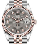 Datejust  36mm Steel with Rose Gold Fluted Bezel on Jubilee Bracelet with Slate Fluted Motif Diamond Dial