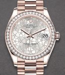 Datejust 31mm in Rose Gold with Dimoand Bezel on President Bracelet with Silver Floral Diamond Dial