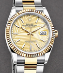 Datejust 36mm in Steel with Yellow Gold Fluted Bezel on Oyster Bracelet with Champagne Palm Motif Stick Dial