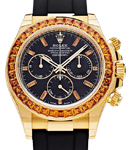 Daytona Cosmograph 40mm in Yellow Gold with Orange Sapphire Bezel on Strap with Black Dial - Orange Baguette Markers