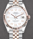 Mid Size 31mm Datejust in Steel with Rose Gold Fluted Bezel on Jubilee Bracelet with MOP Roman Dial