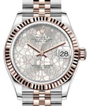 Mid Size 31mm Datejust in Steel with Rose Gold Fluted Bezel on Jubilee Bracelet with Silver Floral Diamond Dial