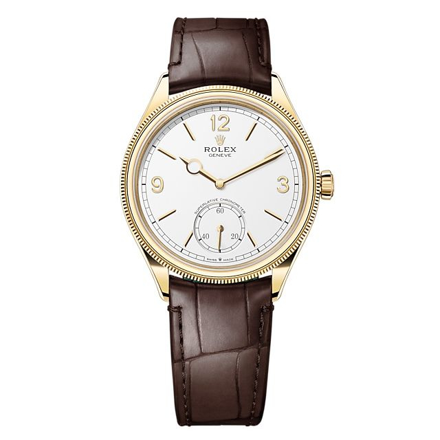 Cellini 52508 in Yellow Gold with Domed and Fluted Bezel on Strap with White Dial