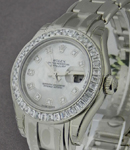 Masterpiece in White Gold with Baguette Diamond Bezel on White Gold Pearlmaster Bracelet with MOP Diamond Dial