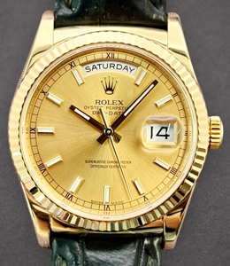 Day-Date President 36mm in Yellow Gold with Fluted Bezel on Greem Crocodile Leather Strap with Champagne Stick Dial