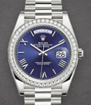 Day Date 40mm in White Gold with Diamond Bezel on President Bracelet with Blue Roman Dial