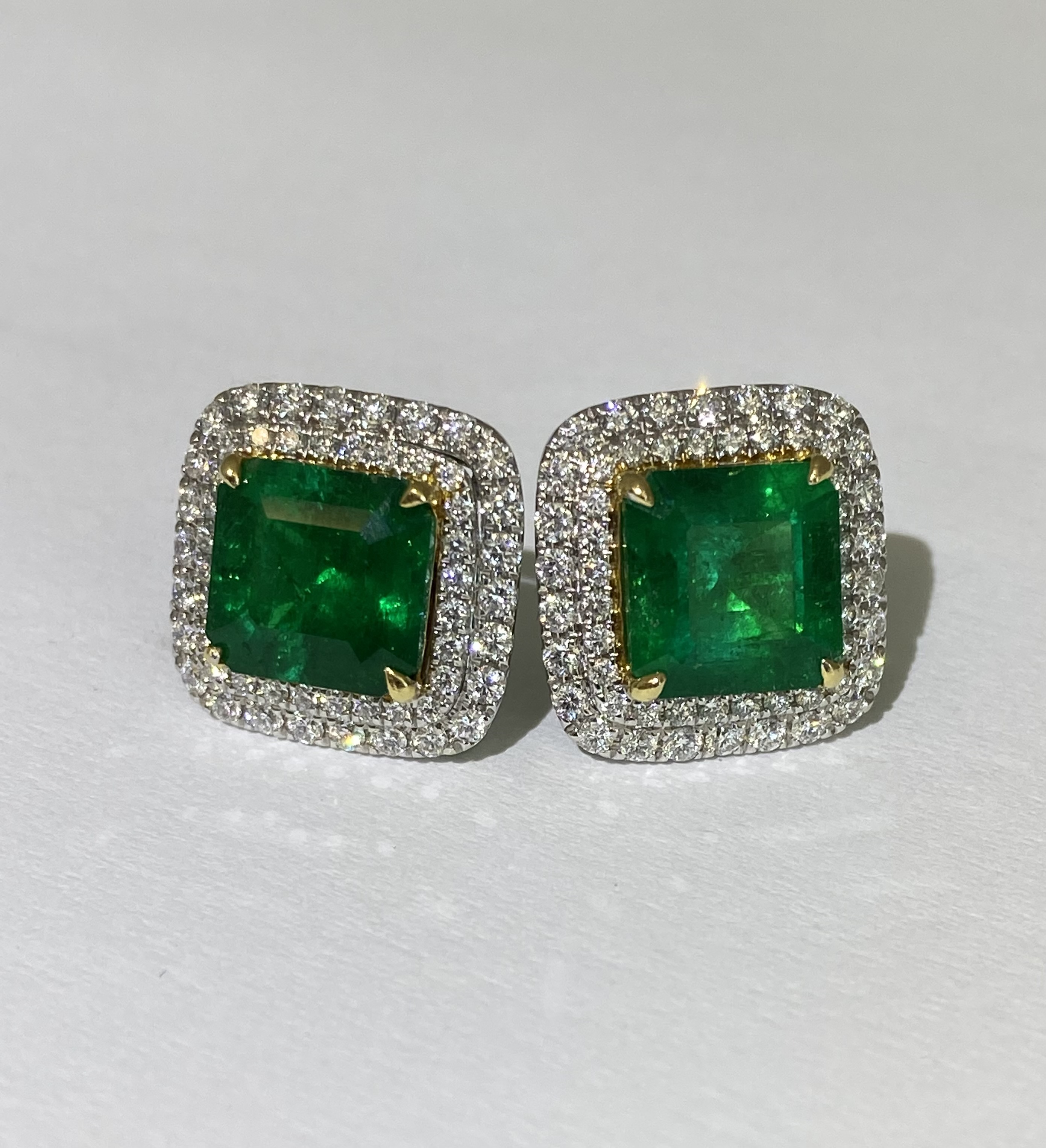Stunning matched pair of Colombian Emerald Diamond Earrings