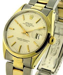 Vintage inSteel with Yellow Gold Smooth Bezel on Steel and Yellow Gold Bracelet with White Stick Dial