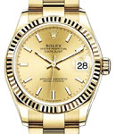 Midsize President in Yellow Gold with Fluted Bezel on Oyster Bracelet with Champagne Stick Dial