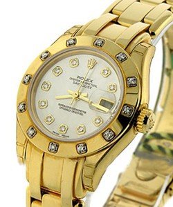 Masterpeice Lady's in Yellow Gold with 12 Diamond Bezel on Yellow Gold Pearlmaster Bracelet with Mother of Pearl Diamond Dial