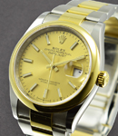 Datejust 36mm in Steel with Yellow Gold Smooth Bezel on Oyster Bracelet with Champagne Stick Dial