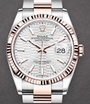 Datejust 36mm in Steel with Rose Gold Fluted Bezel on Oyster Bracelet with Silver Fluted Motif Dial