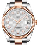 Datejust 36mm in Steel with Rose Gold Fluted Bezel on Oyster Bracelet with Silver Fluted Motif Diamond Dial