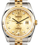 Datejust 36mm in Steel with Yellow Gold Fluted Bezel on Jubilee Bracelet with Champagne Jubilee Diamond Dial