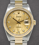 Datejust 36mm in Steel with Yellow Gold Fluted Bezel on Oyster Bracelet with Champagne Jubilee Diamond Dial