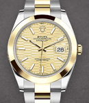 Datejust 41mm in Steel with Yellow Gold Smooth Bezel on Oyster Bracelet with Champagne fluted Motif Dial