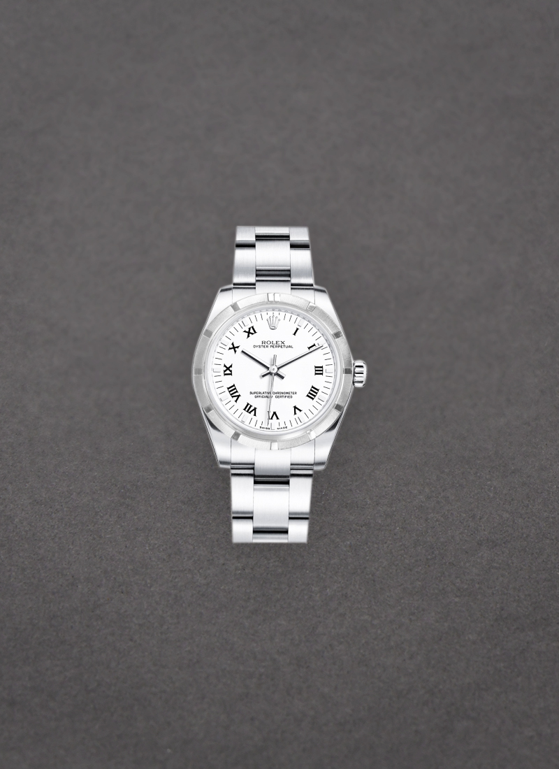 Pre-Owned Rolex Mid Size 31mm Oyster Perpetual in Steel with Engine Turned Bezel