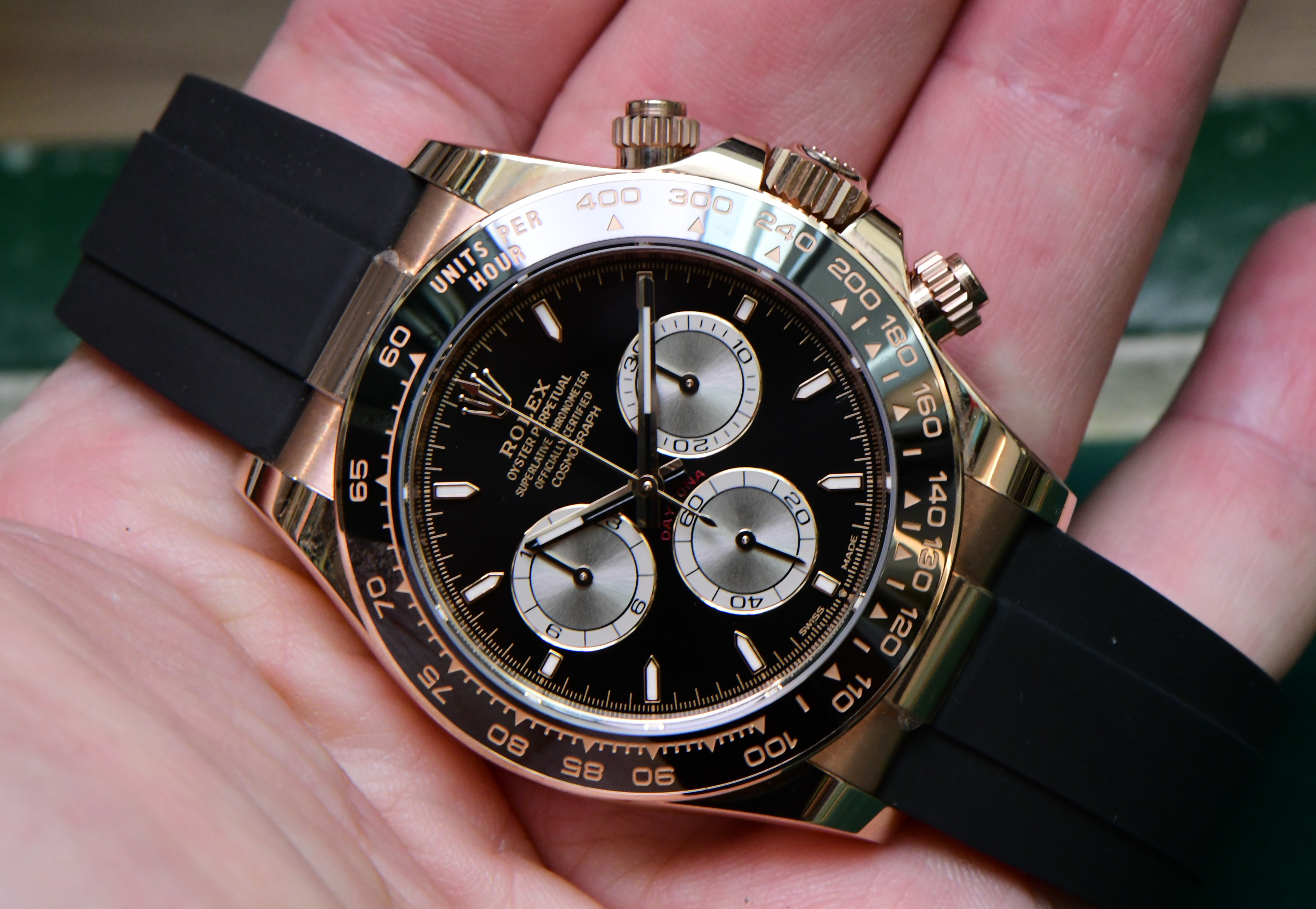 Pre-Owned Rolex Daytona 40mm in Rose Gold with Black Ceramic Bezel on Strap with Black Dial
