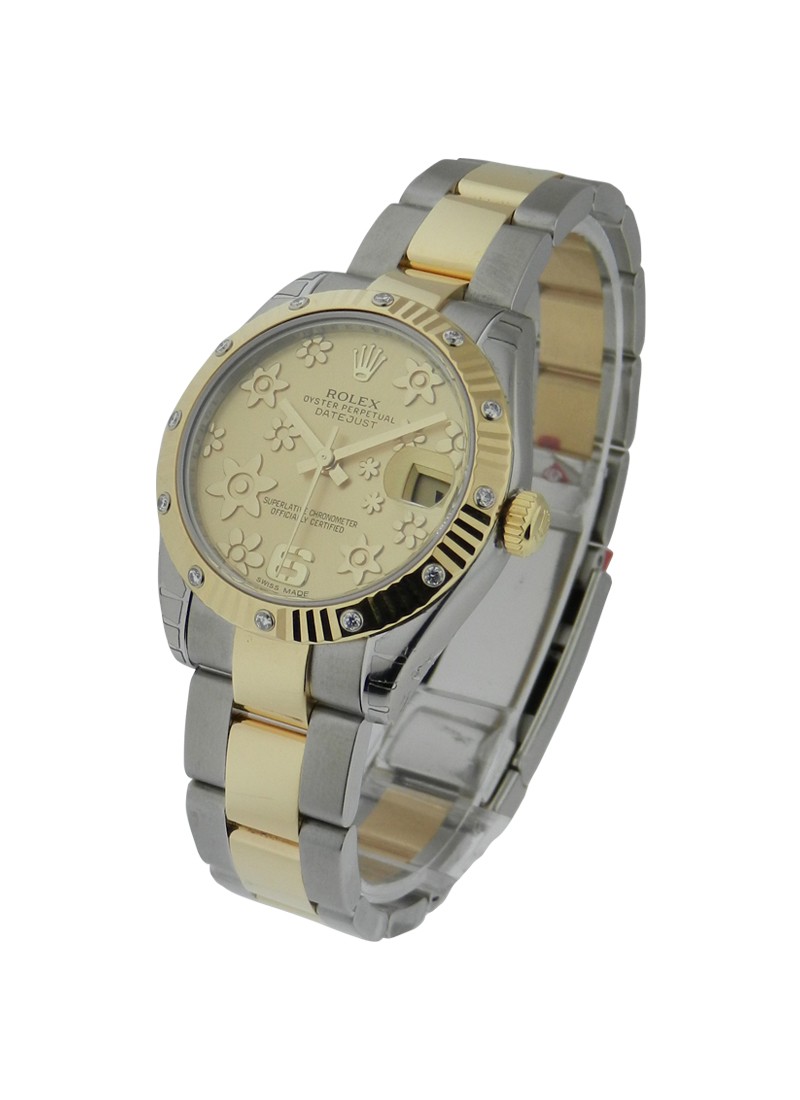 Datejust 31mm in Steel with Yellow Gold Fluted Diamond Bezel on Oyster Bracelet with Champagne Floral Dial