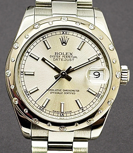 Datejust 31mm in Steel with White Gold Scattered Diamond Bezel on Oyster Bracelet with Silver Index Dial