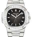 Nautilus 5711 in Steel with Baguette Diamond Bezel on Steel Bracelet with Black Diamond Dial