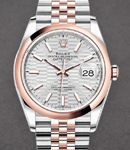 Datejust 36mm in Steel with Rose Gold Smooth Bezel on Jubilee Bracelet with Silver Fluted Motif  Dial