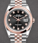 Datejust 36mm in Steel with Rose Gold Smooth Bezel on Jubilee Bracelet with Black Diamond Dial