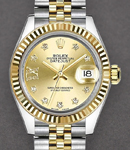 Ladies Datejust 28mm in Steel with Yellow Gold Fluted Bezel on Jubilee Bracelet with Champagne Star Diamond Dial