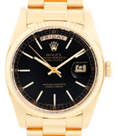 Day-Date 36mm in Yellow Gold with Fluted Bezel on President Bracelet with Black Stick Dial