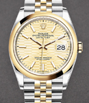 Datejust 36mm in Steel with Yellow Gold Smooth Bezel On Jubilee Bracelet with Champagne Fluted Motif Dial