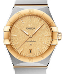 Constellation Co-Axial 36mm Quartz in Steel with Yellow Gold Bezel on Steel and Yellow Gold Bracelet with Champagne Dial