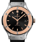 Classic Fusion 38mm in Titanium with Rose Gold Bezel on Black Rubber Strap with Black Dial