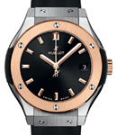 Classic Fusion 33mm in Titanium with Rose Gold Bezel on Black Rubber Strap with Black Dial